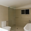 Clayfield main bathroom fixed shower head brick bond tiles