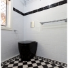 Cashmere ensuite subway wall tiles black feature tile in wall cistern toilet suite