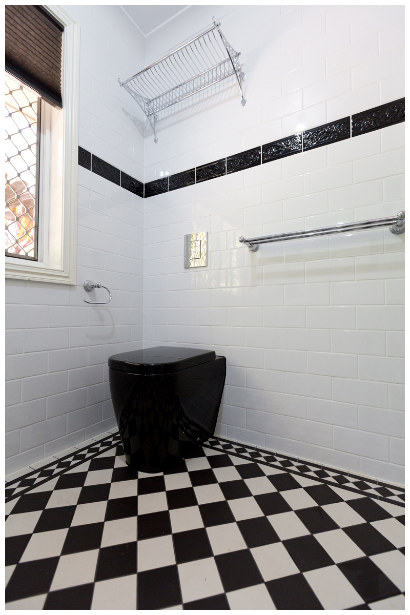 Cashmere ensuite subway wall tiles black feature tile in wall cistern toilet suite