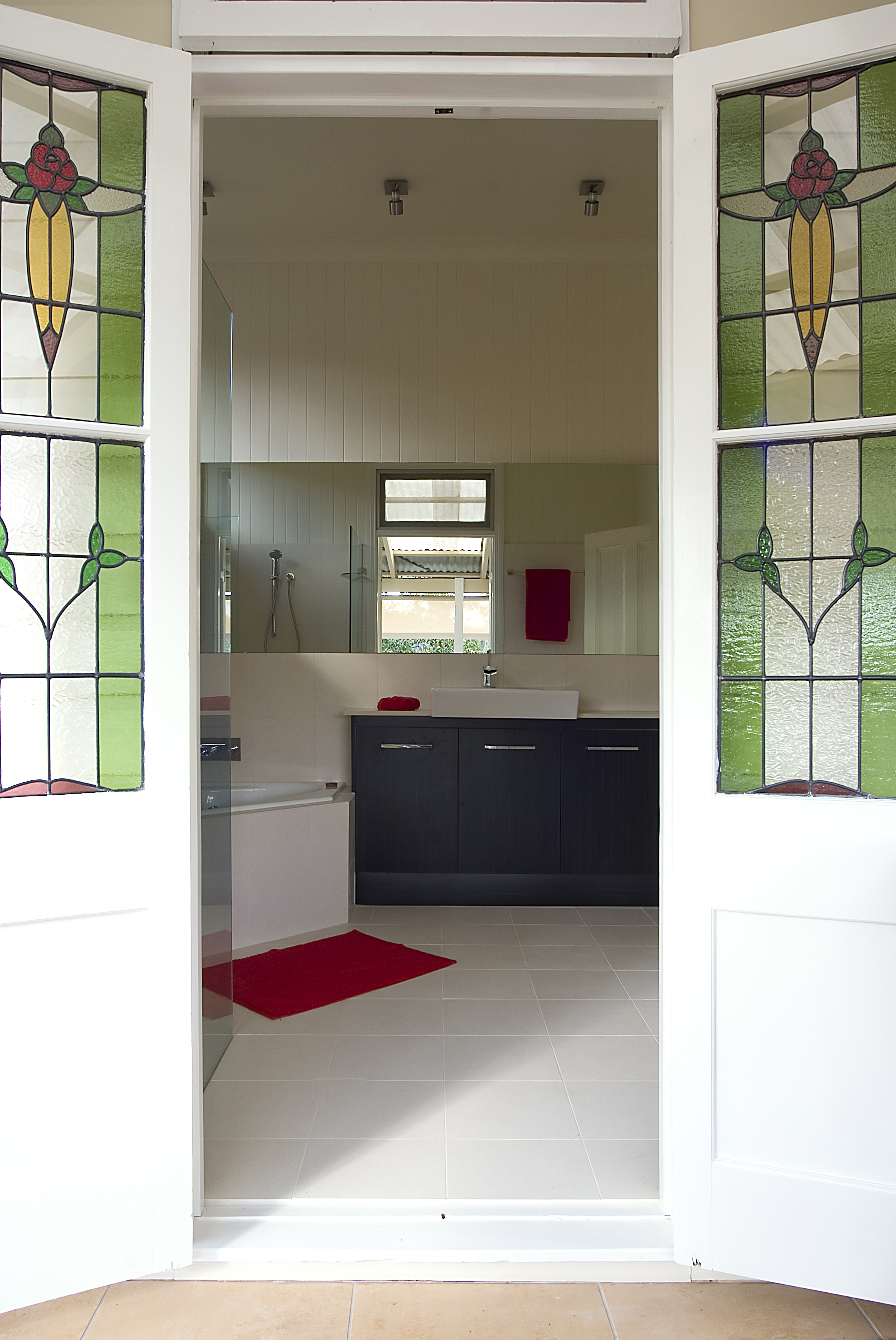 Auchenflower Queenslander bathroom stained glass French doors from verandah