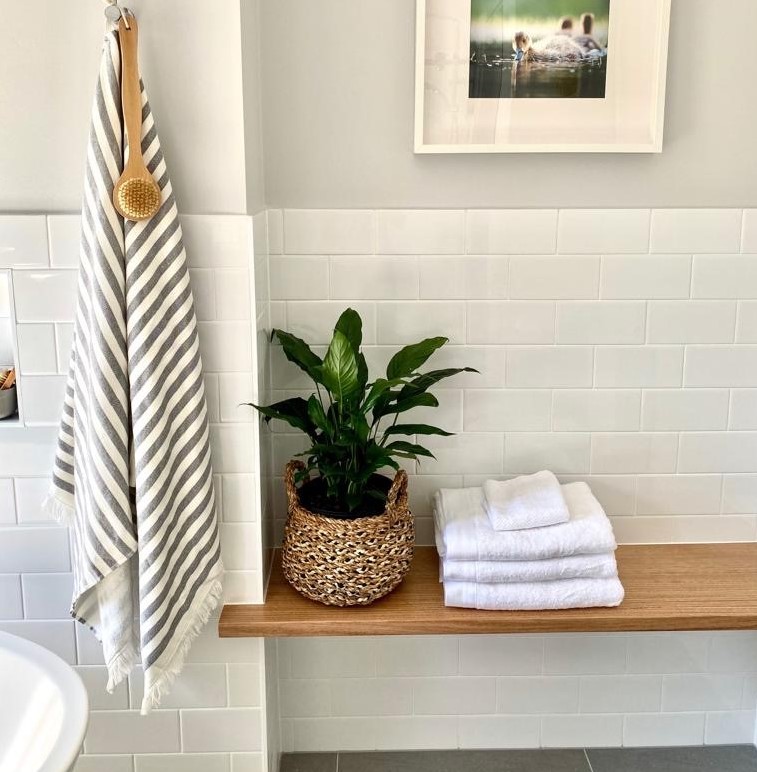 Bardon bathroom natural bench white wall tile free-standing bath